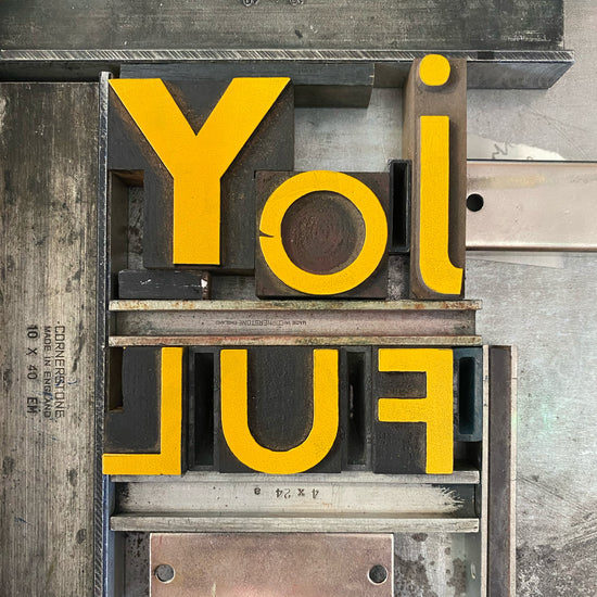 Joyful yellow wood type - double impression small poster